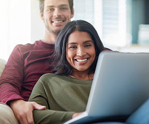 man and woman on couch